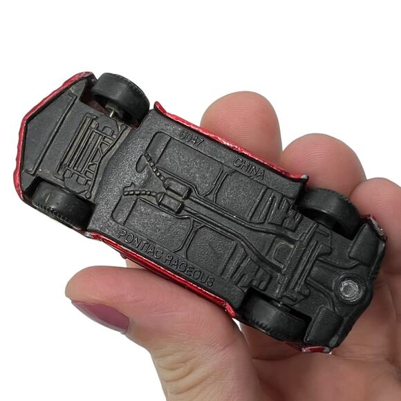 Red Diecast Toy Car with Yellow Flame Decals & Rear Spoiler 1:64 - Picture 7 of 7